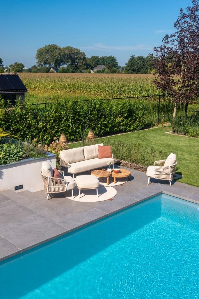 outdoor living set package with outdoor sofa, outdoor armchairs, and outdoor coffee table made with teak wood available in malaga, marbella, costa del sol.