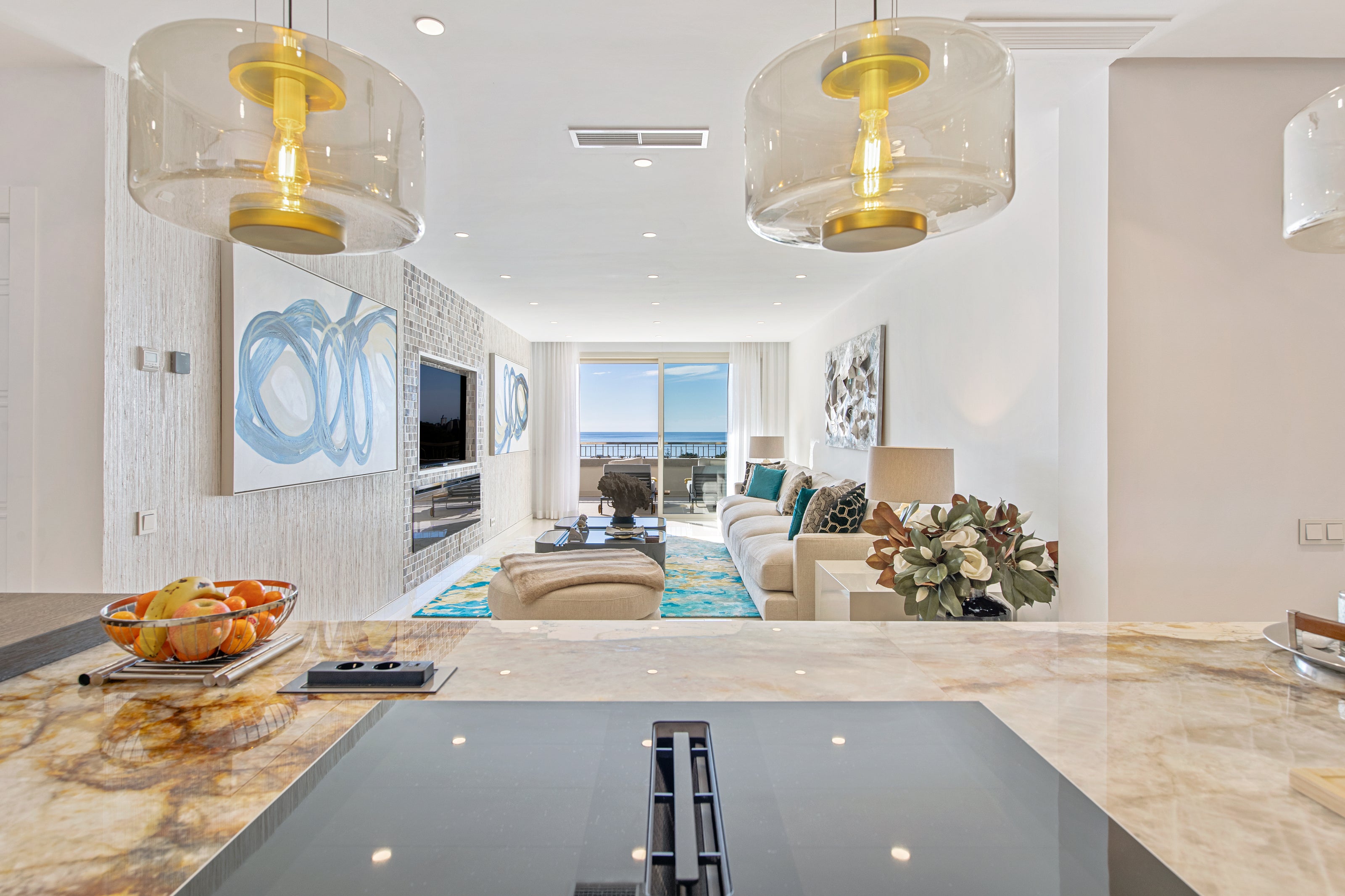 luxury interior design for living room with yellow and blue green tones, sofa, rug, ceiling lamp available in casares, marbella, malaga, costa del sol.