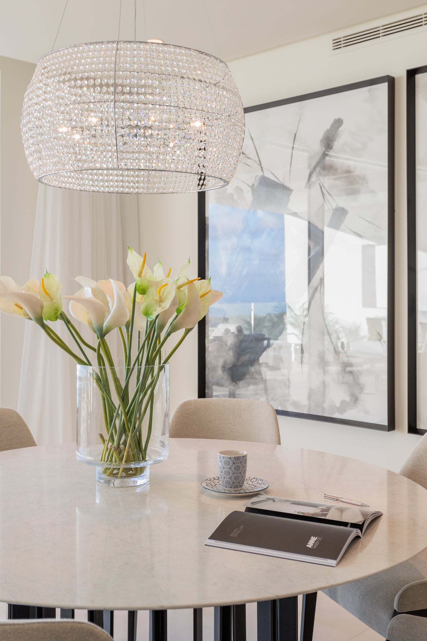 Elegant luxurious dining table, dining chair, ceiling lamp, and decors available in marbella, malaga, costa del sol, fuengirola, estepona.