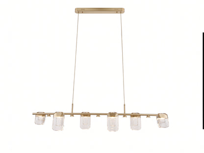 A modern linear chandelier with a brushed gold metal frame and six clear glass shades, suspended by thin cords from a square ceiling canopy.