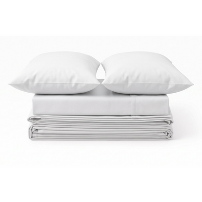 A neatly stacked bedding set on a white background, featuring two white pillows resting on top of a folded white sheet or duvet.