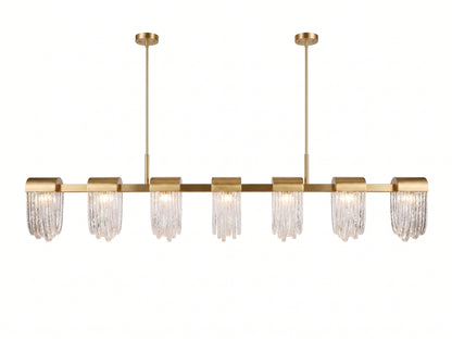 A modern linear chandelier with a brushed gold metal frame and six clear crystal droplet tubes, suspended from two vertical rods against a solid white background.