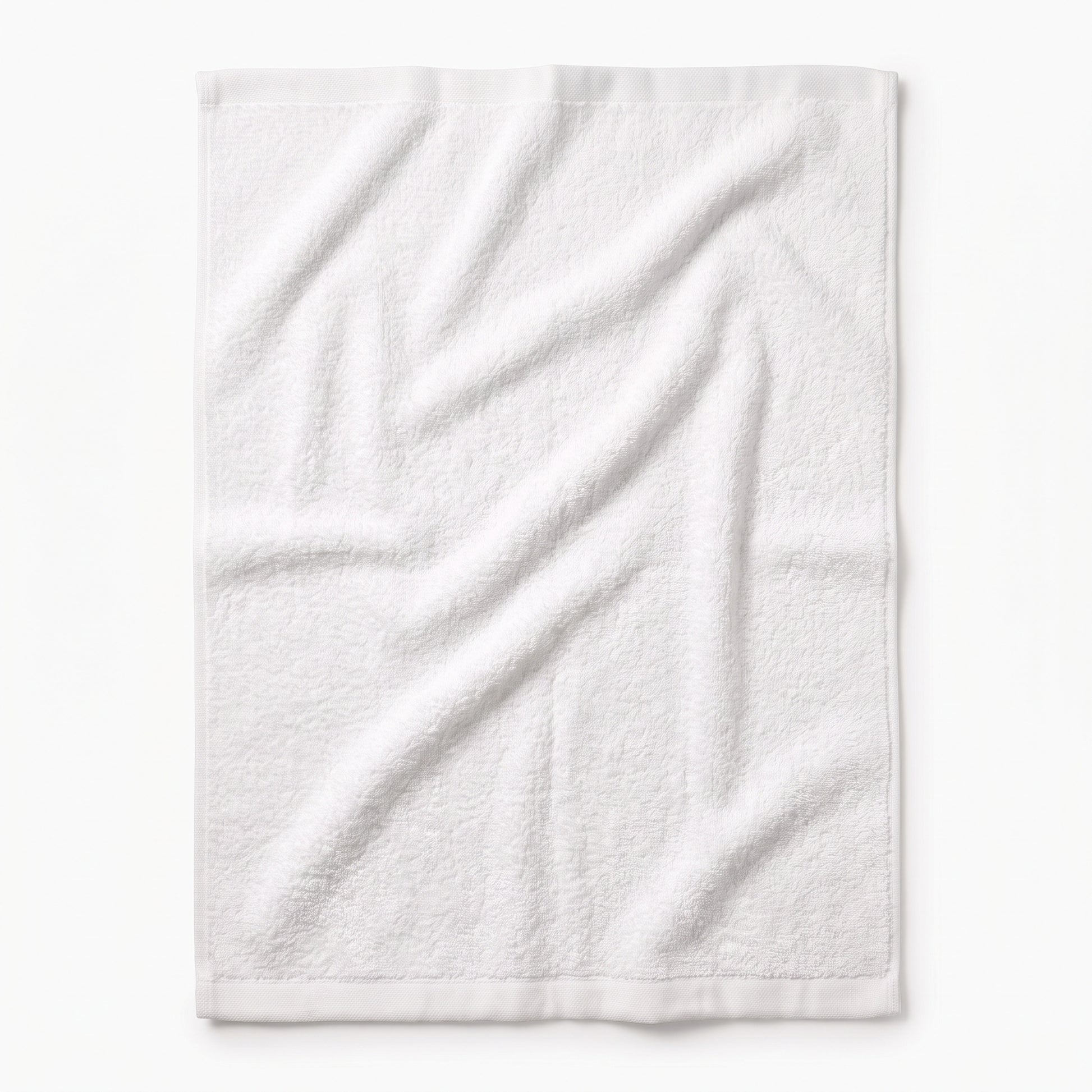 A white cotton towel with a textured terry cloth surface, shown flat against a clean white background.