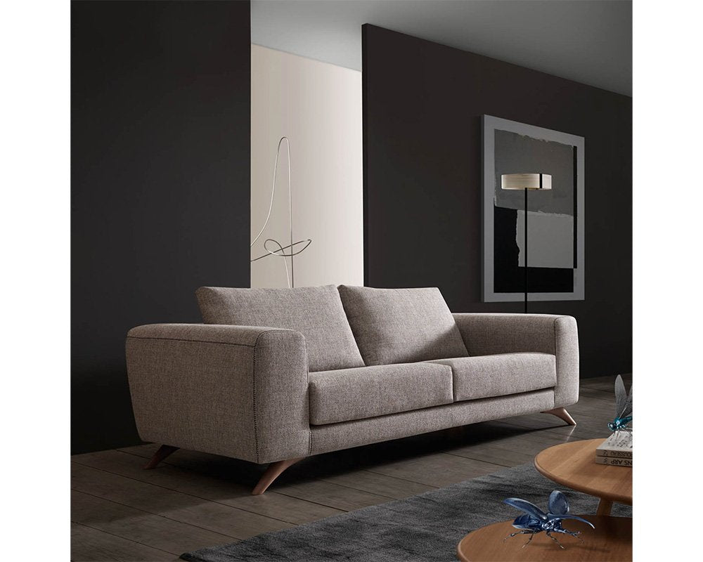 minimalist contemporary 3 seater sofa with wooden legs and thick arm wrest available in nueva andalucia, marbella, mijas, san pedro de alcantara.