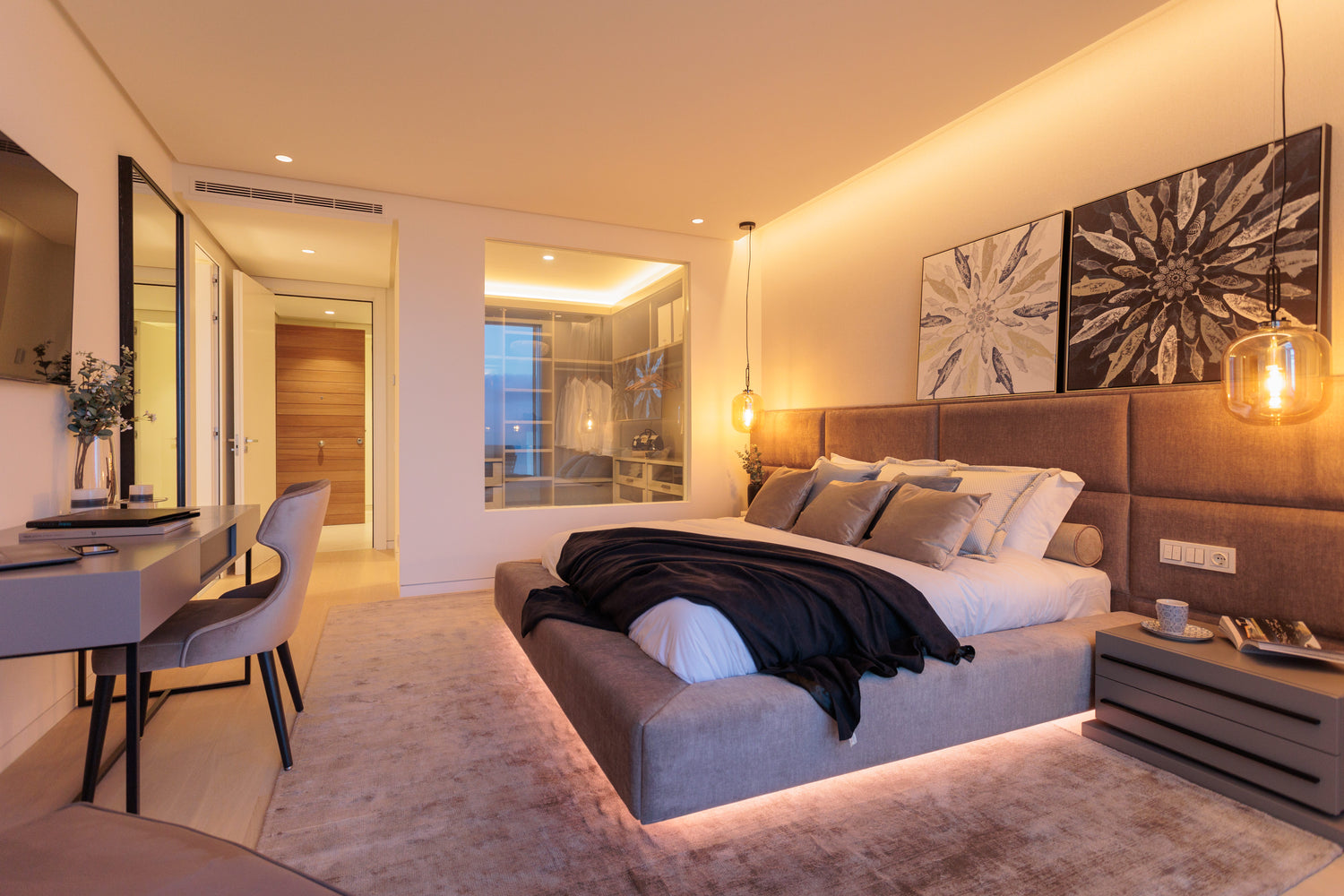 modern contemporary interior design for bedroom with floating bed with led lights, headboard, bedside table, rug, ceiling lamp, table available in benahavis, bel air, marbella, malaga, costa del sol.