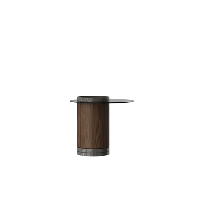 A modern cylindrical side table featuring a dark brown wood grain column base, a circular black glass tabletop, and a brushed silver metal base ring, shown on a light gray background.